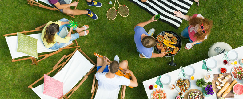 Residents at an apartment community relaxing outside