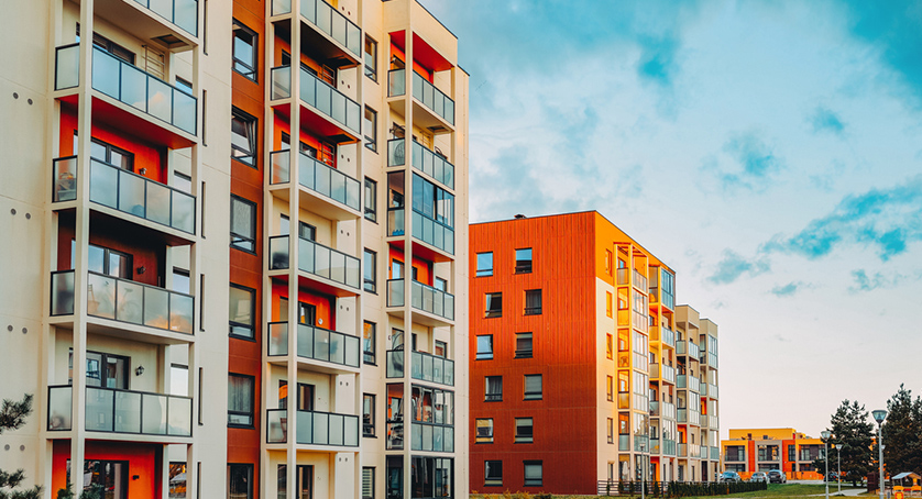 Apartment buildings at sunset, where people work from during the new normal