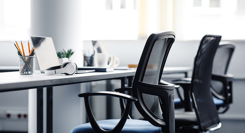 Empty chairs and desks in an office