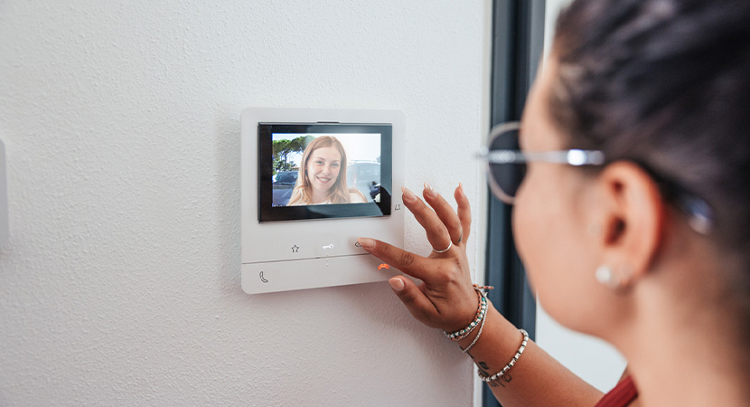 Lady using an intercom system