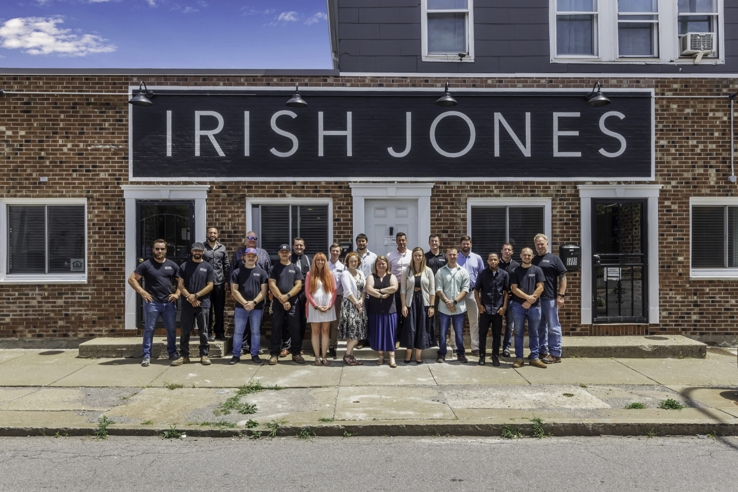 Doino and the Irish Jones team in front of their office building.