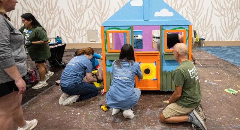 RMUC.25 Attendees building playhouses for Habitat for Humanity