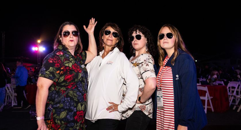 Top Gun Takeoff Social Event Attendees Posing